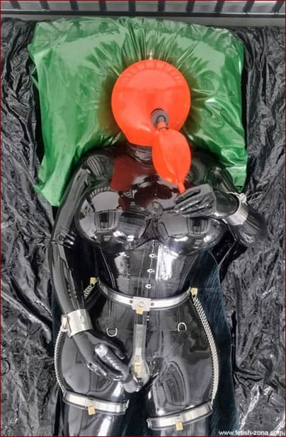Rubberdollemma in steel chastity belt and rubber ball on her head - FULL HD