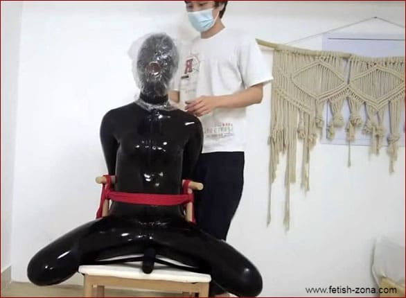 Breath play in latex and with vibrator between the legs - HD